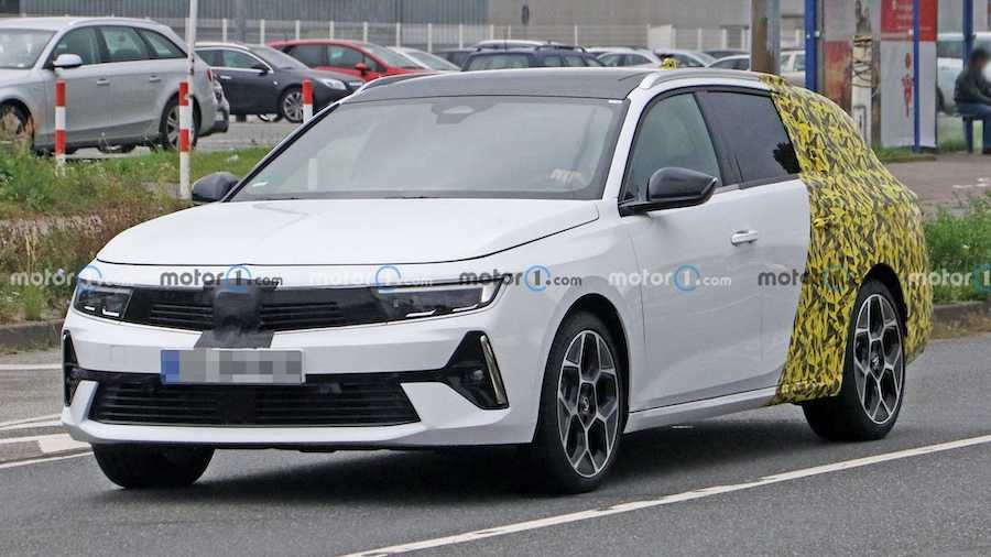 Opel Astra Sports Tourer Spied With Camouflaged Rear End